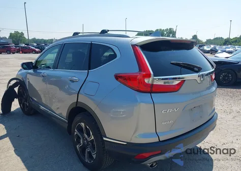 2017 Honda Cr-V Touring z USA, uszkodzony, nr VIN 5J6RW2H93HL034300